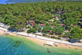 Mobile Homes in Camp Kovacine, Cres, with long pebble beach